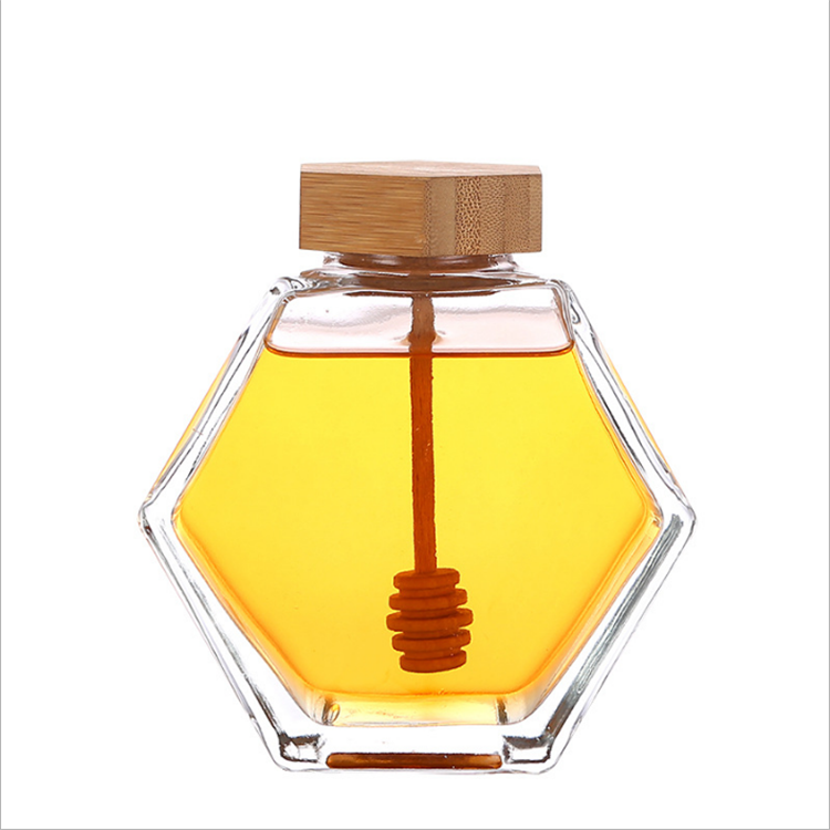 220ml 380ml Wholesale customized empty clear hexagonal glass honey jar with wooden lid and dipper