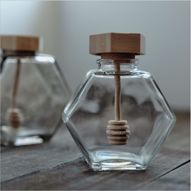 220ml 380ml Wholesale customized empty clear hexagonal glass honey jar with wooden lid and dipper