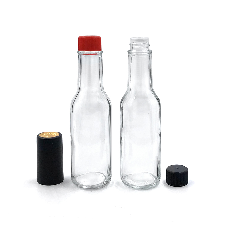 (24 Pack) 5 oz. Clear Glass Hot Sauce Woozy Bottles with Black Cap Shrink band and Orifice Reducer