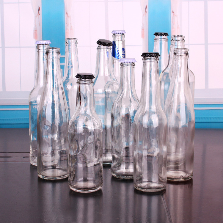 250ml 330ml Transparent glass beer bottle with crown lid