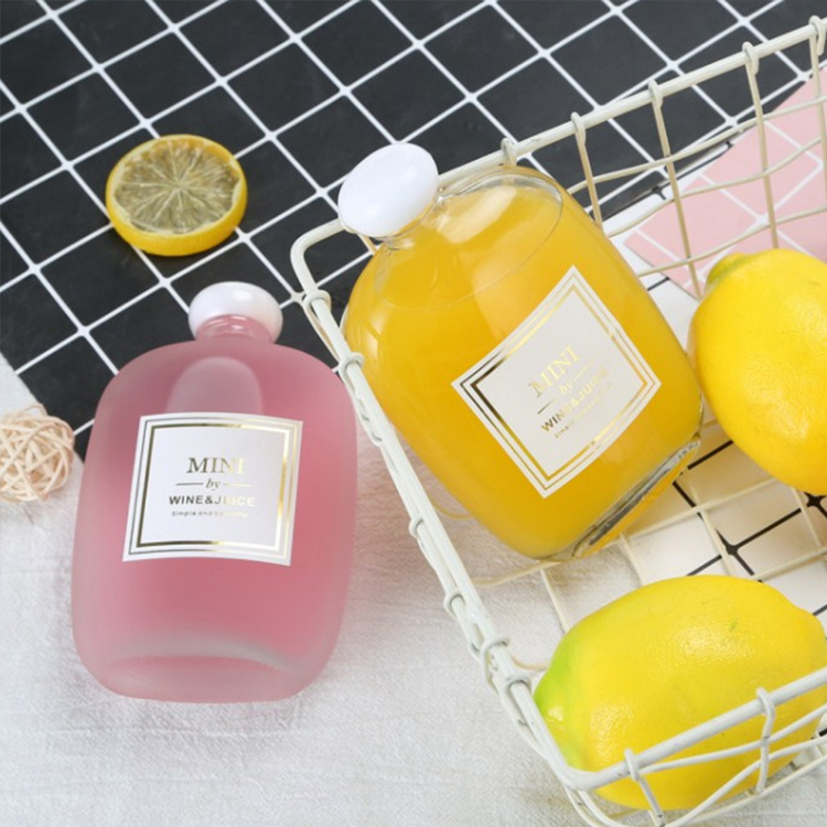 250ml Cheap Cute Flat Round Eco Friendly Clear cold pressed Glass Juice drinks Bottle