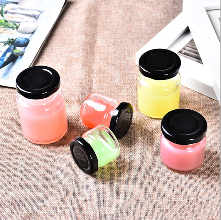 25g,50g,75g,100g food grade mini round glass honey jar for storage with black tin lid