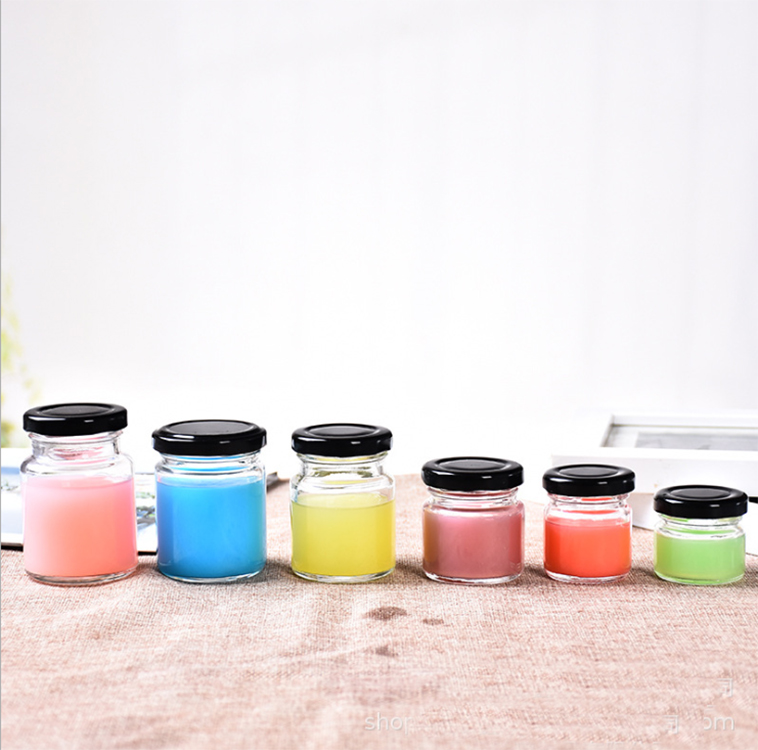 25g,50g,75g,100g food grade mini round glass honey jar for storage with black tin lid