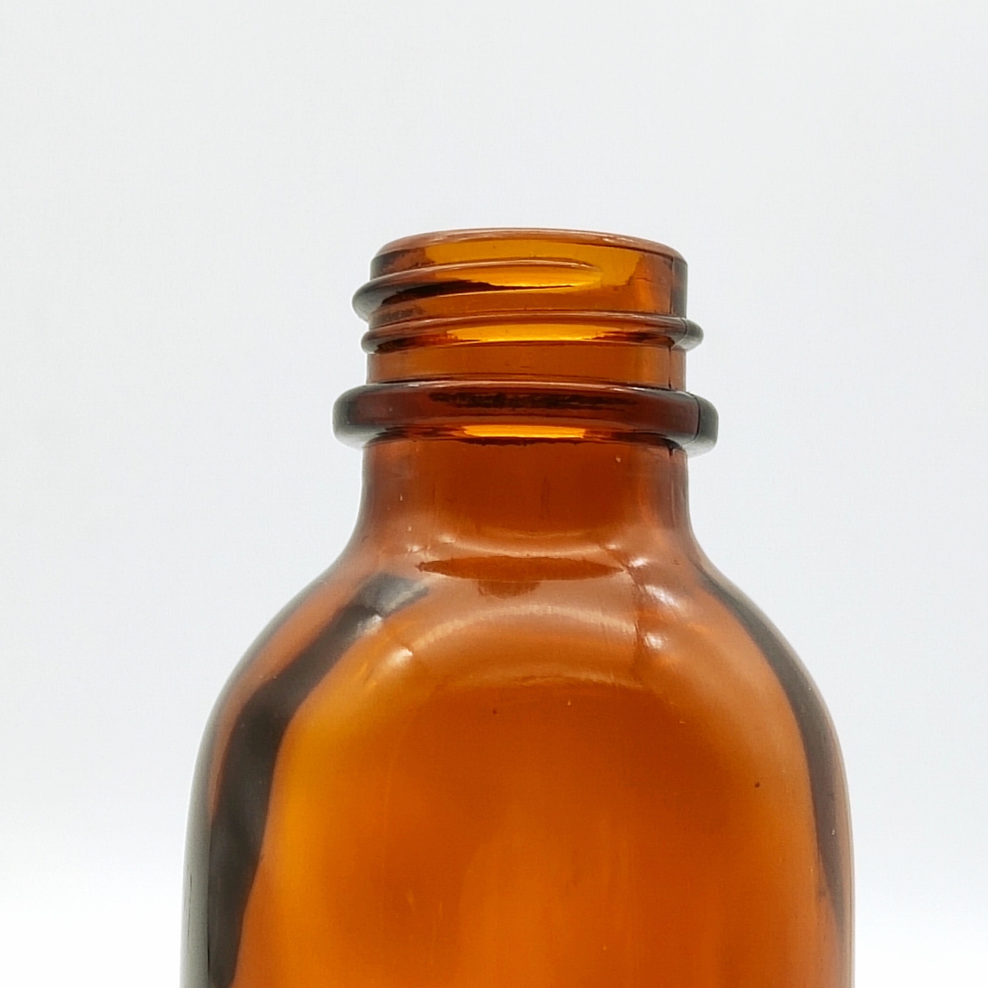 2OZ amber boston round glass bottle