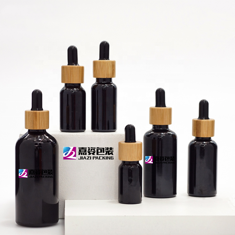 2oz 4oz 30ml cosmetic frosted Matte black Essential Oil glass dropper boston round bottles 30ml tincture serum bottle