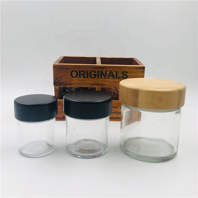 2oz 4oz 8oz transparent empty childproof glass jars Glass Container Jars with bamboo screw lids for flowers