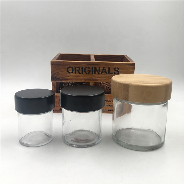 2oz 4oz 8oz transparent empty childproof glass jars Glass Container Jars with bamboo screw lids for flowers
