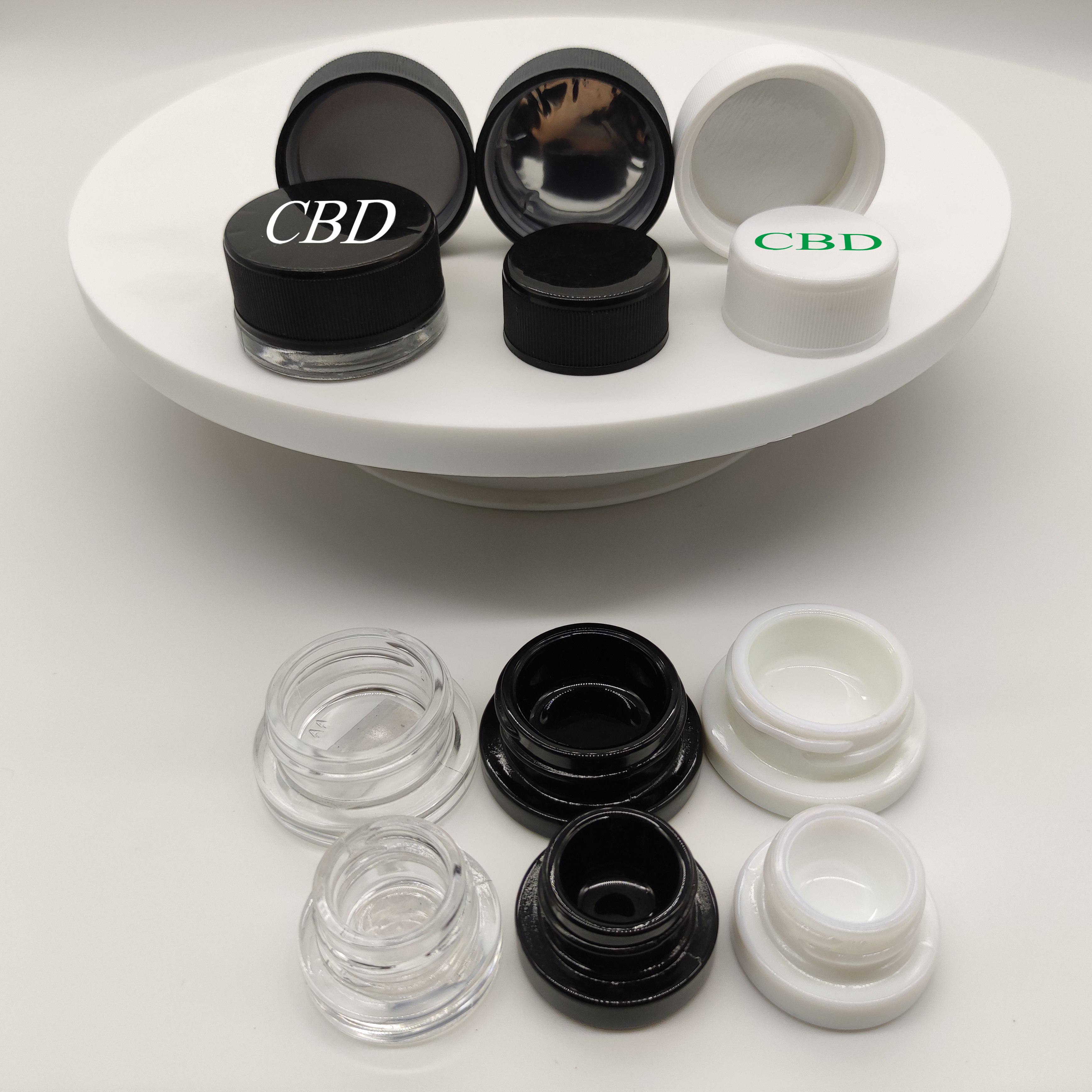 2oz 50ml custom logo clear glass round cosmetic face cream jars without child resistant CR cap smell proof CBD dab wax jars