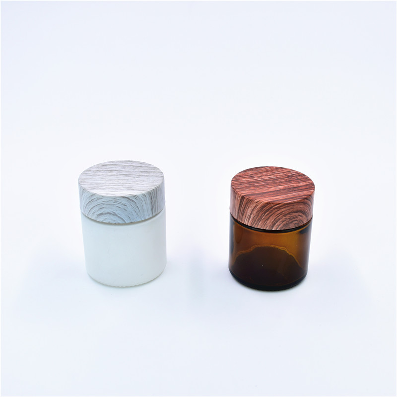 2oz Amber UV Children Resistant Glass Container Weeds Jars Childproof Glass Jar With Black Childproof Wooden Grain Lids