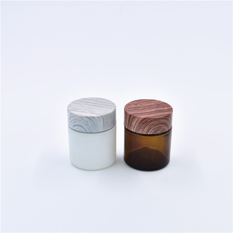 2oz Amber UV Children Resistant Glass Container Weeds Jars Childproof Glass Jar With Black Childproof Wooden Grain Lids