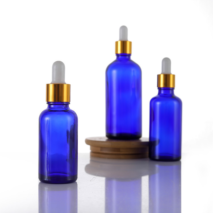2oz Blue Glass Dropper Bottle For Eliquids With Silver Aluminum Dropper Cap