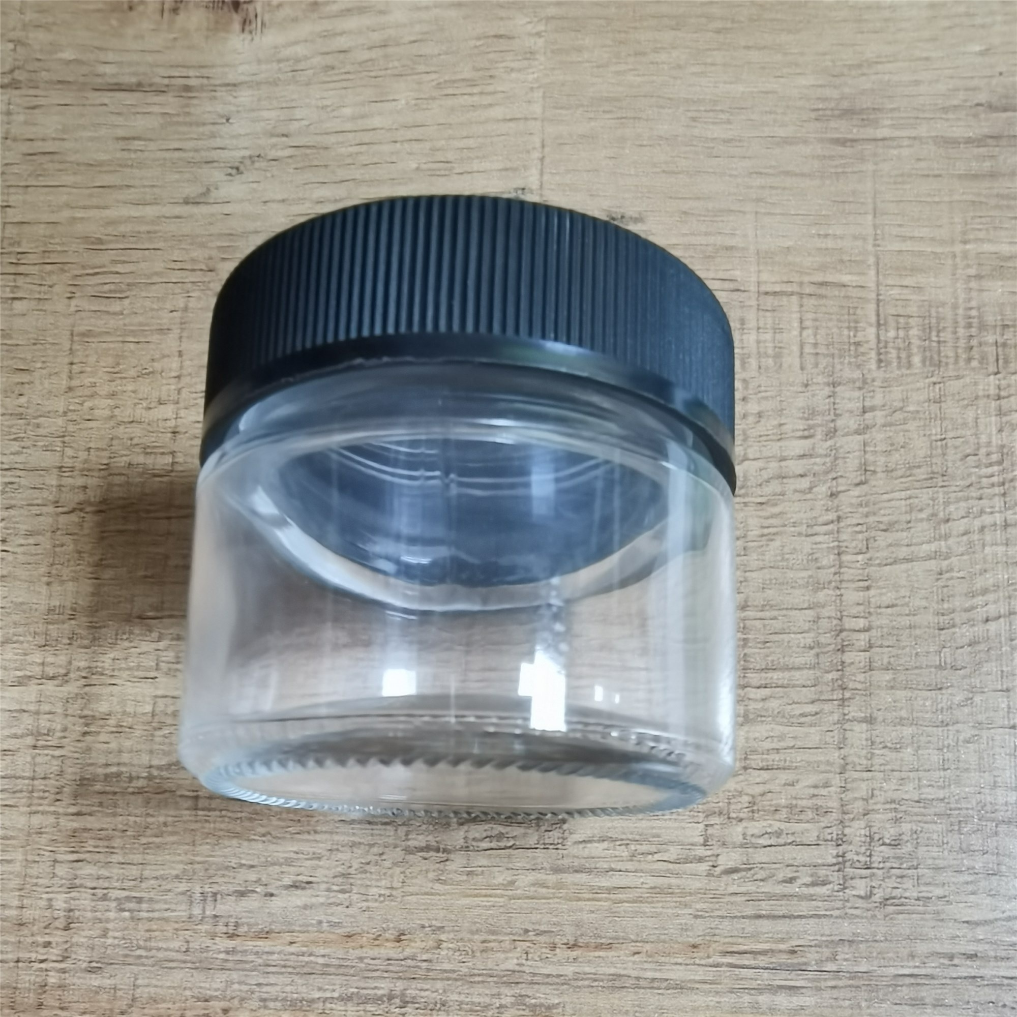 2oz Child Resistant Glass Jars with Lids Clear Jar Black Lid