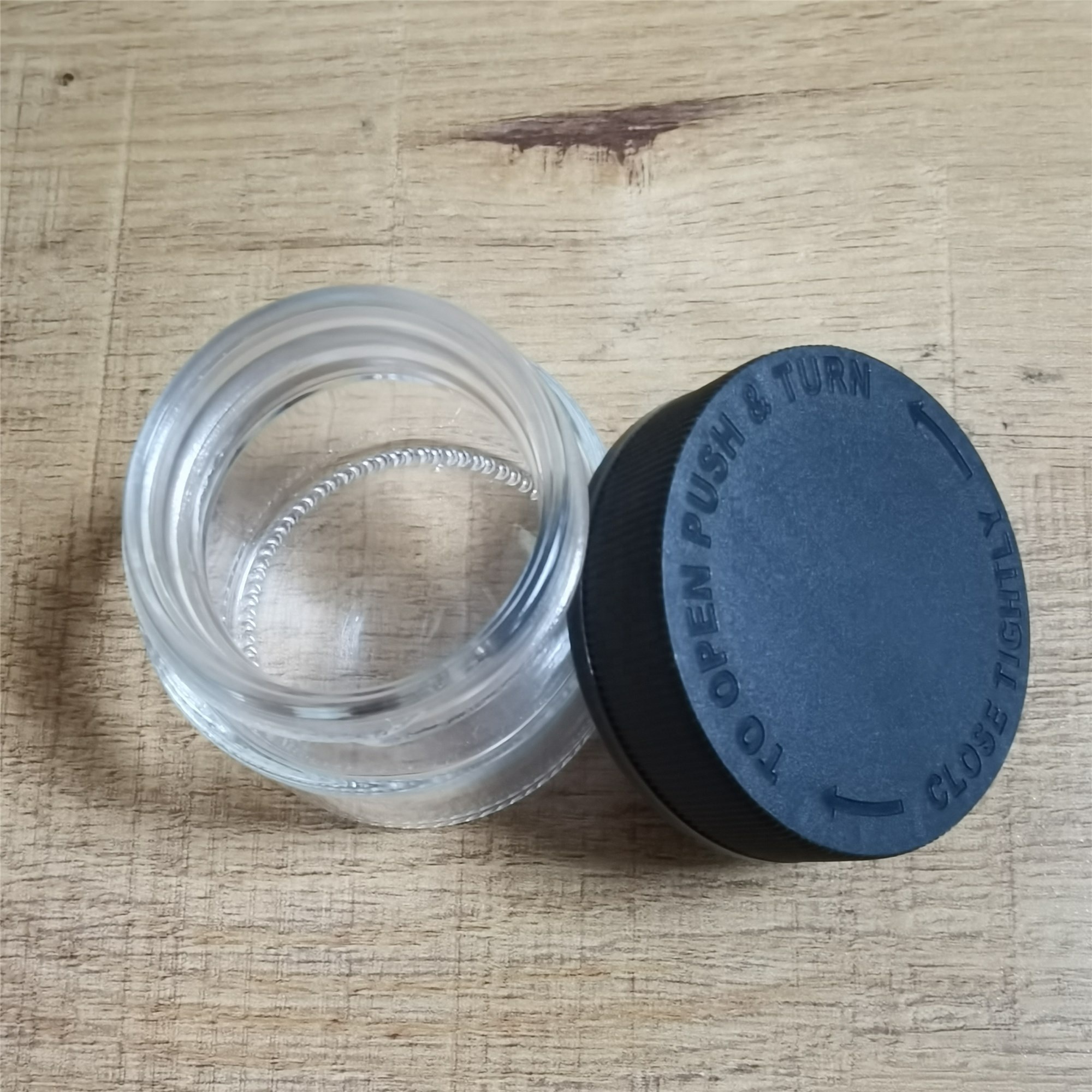 2oz Child Resistant Glass Jars with Lids Clear Jar Black Lid