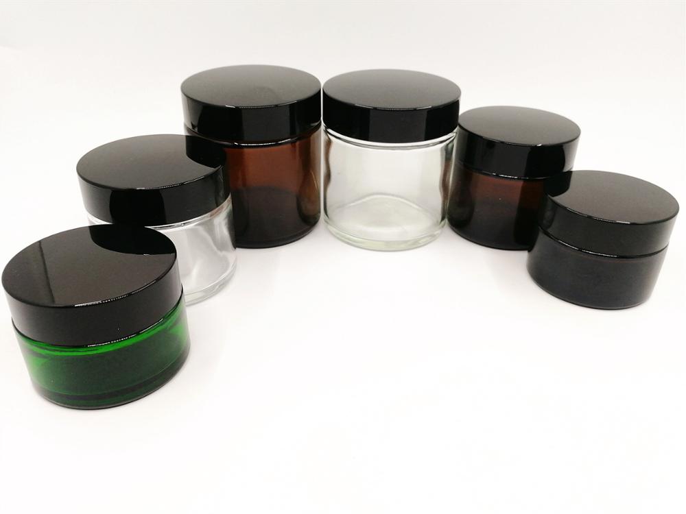 2oz amber glass jars with black screw cap and fitment for skincare