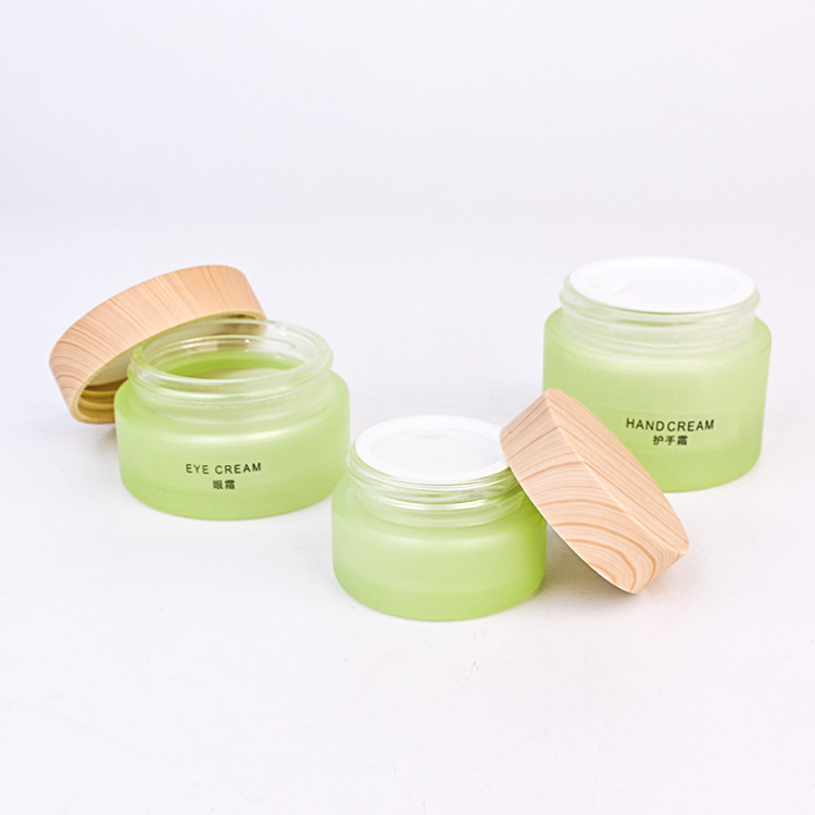 2oz cosmetic packaging frosted green glass face cream jar with plastic cap