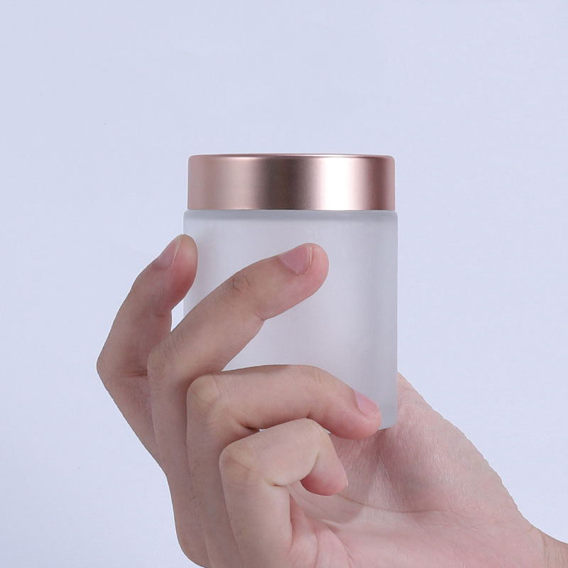2oz face eye cream cosmetic packaging glass jar with rose gold lid