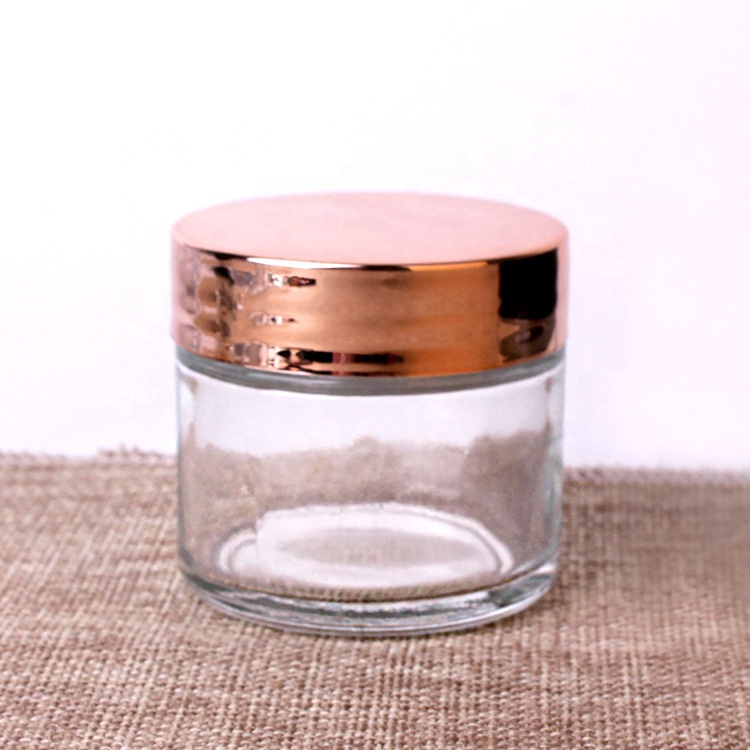 2oz short cosmetic glass round jars rose golden plastic lid