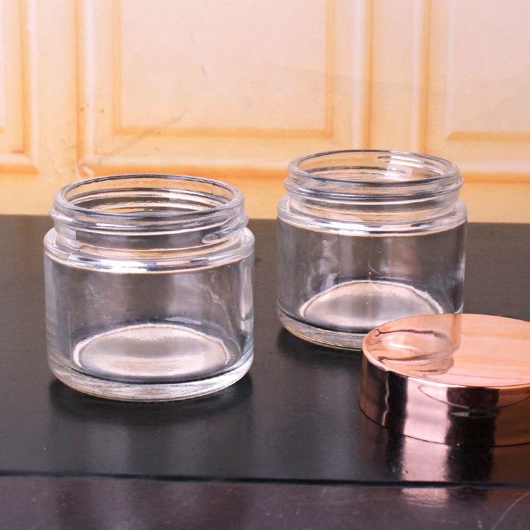 2oz short cosmetic glass round jars rose golden plastic lid