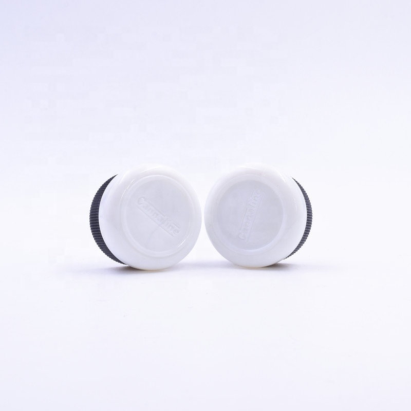 3 ml white round small straight side eye cream cosmetic packing glass jar with black plastic child proof lid.