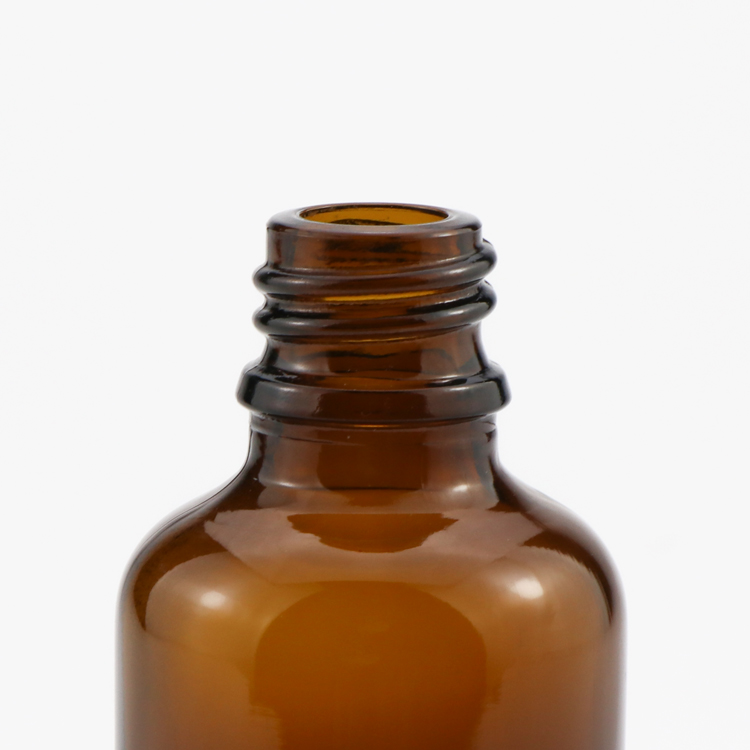 30 ml 2 oz amber tincture essential oil glass bottle with black childproof dropper and temper cap wholesale