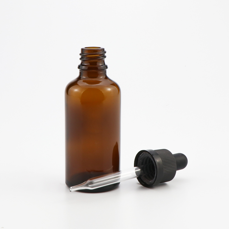 30 ml 2 oz amber tincture essential oil glass bottle with black childproof dropper and temper cap wholesale