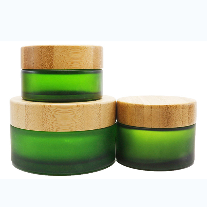 30g 50g 100g frosted transparent green glass jar with bamboo lid 1oz 2oz 3oz customs printing glass wooden container cream