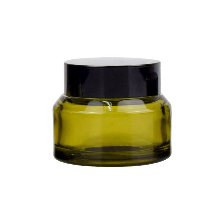 30g 50g wholesale fancy slant shoulder clear green glass cosmetic face eye cream jar for skin care with black plastic screw lid