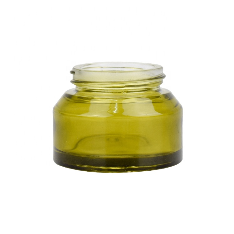 30g 50g wholesale fancy slant shoulder clear green glass cosmetic face eye cream jar for skin care with black plastic screw lid