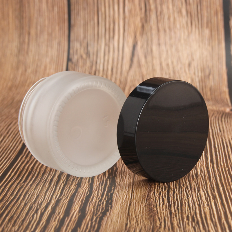 30g cosmetic frosted glass jar mask eye cream packaging container with plastic black lid