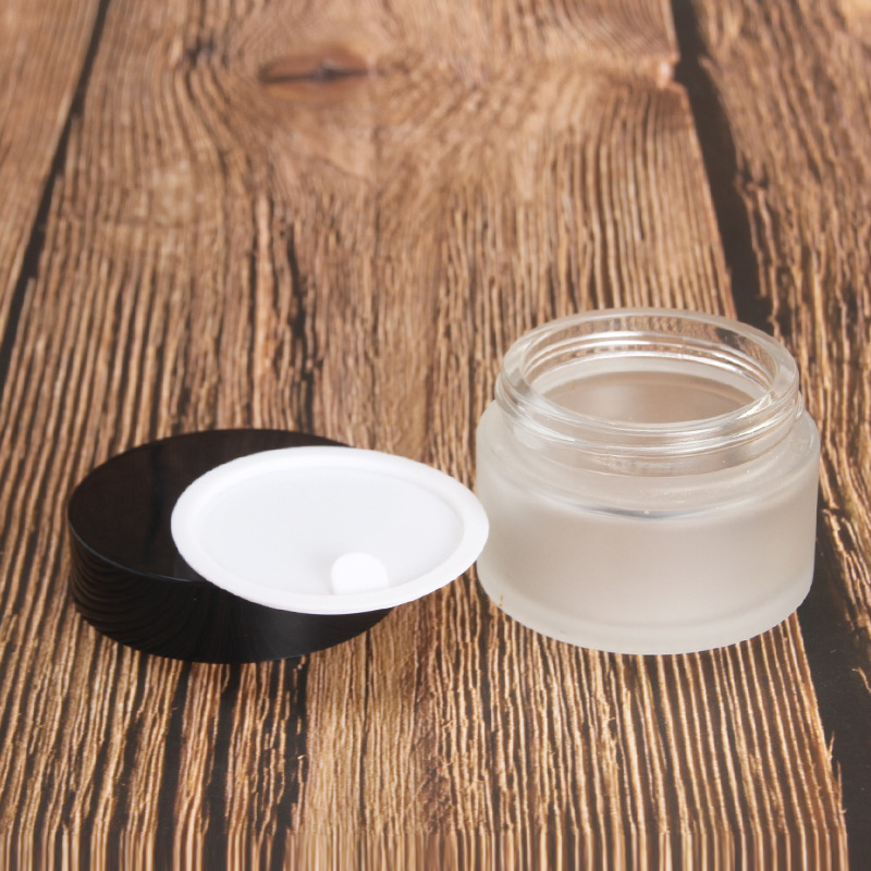30g cosmetic frosted glass jar mask eye cream packaging container with plastic black lid