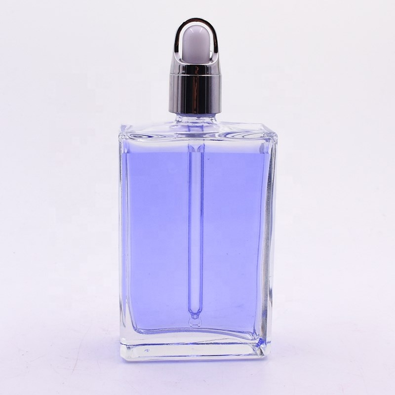 30ml 100ml clear rectangle square essential oil glass bottle for serum lotion cosmetics packaging with dropper lid pipette spray
