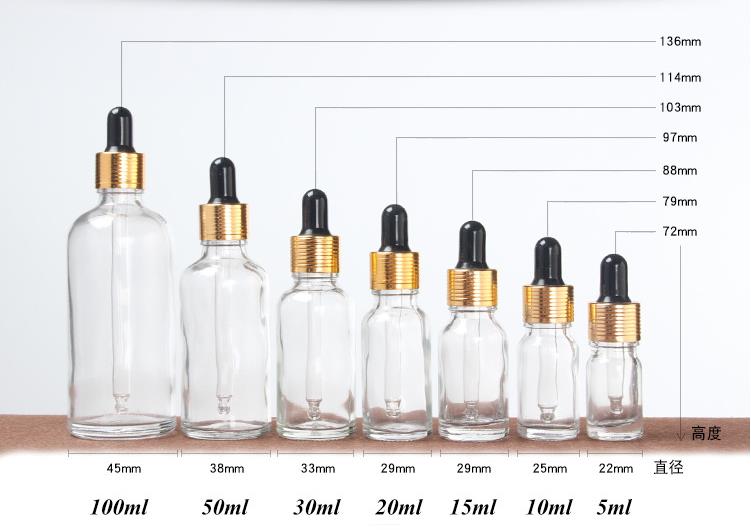 30ml 100ml transparent glass bottle essential oil bottle with stopper gold cap for cosmetic packing
