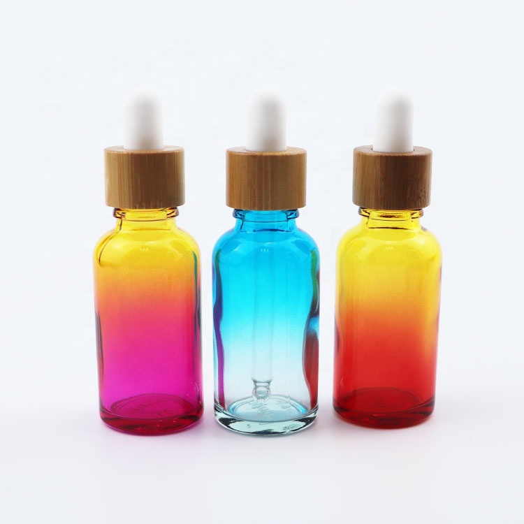 30ml 1oz 1ounce cosmetic skin care face oil bottles premium glass dropper bottles for oil with bamboo cap lid