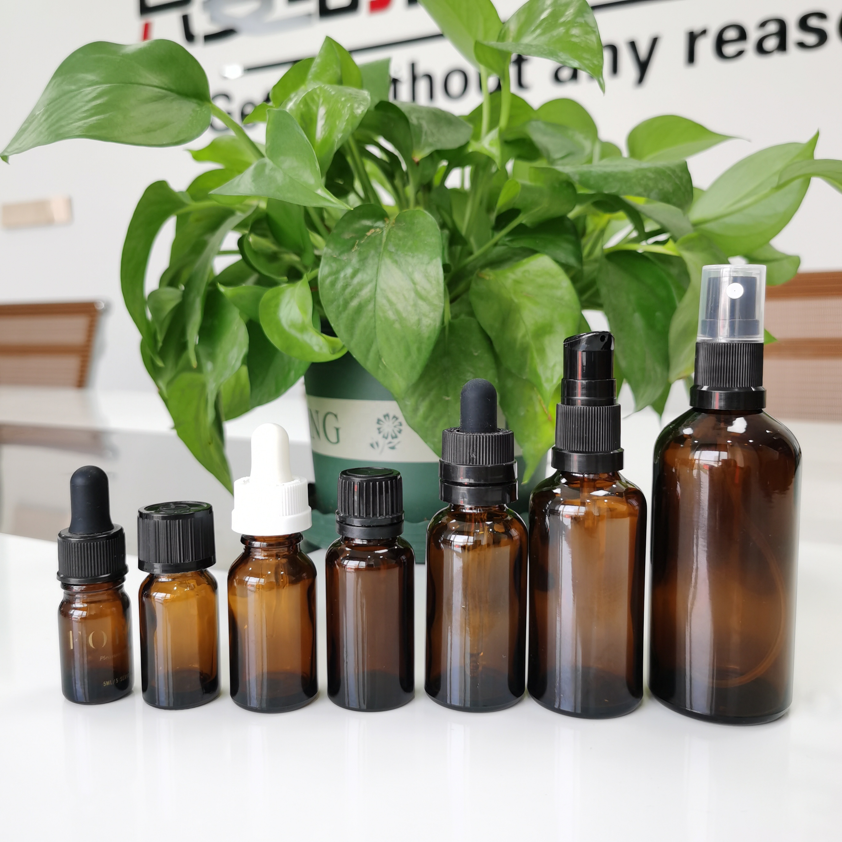30ml 1oz amber essential oil glass bottle with child resistant and tamper evident glass dropper for cosmetic packaging