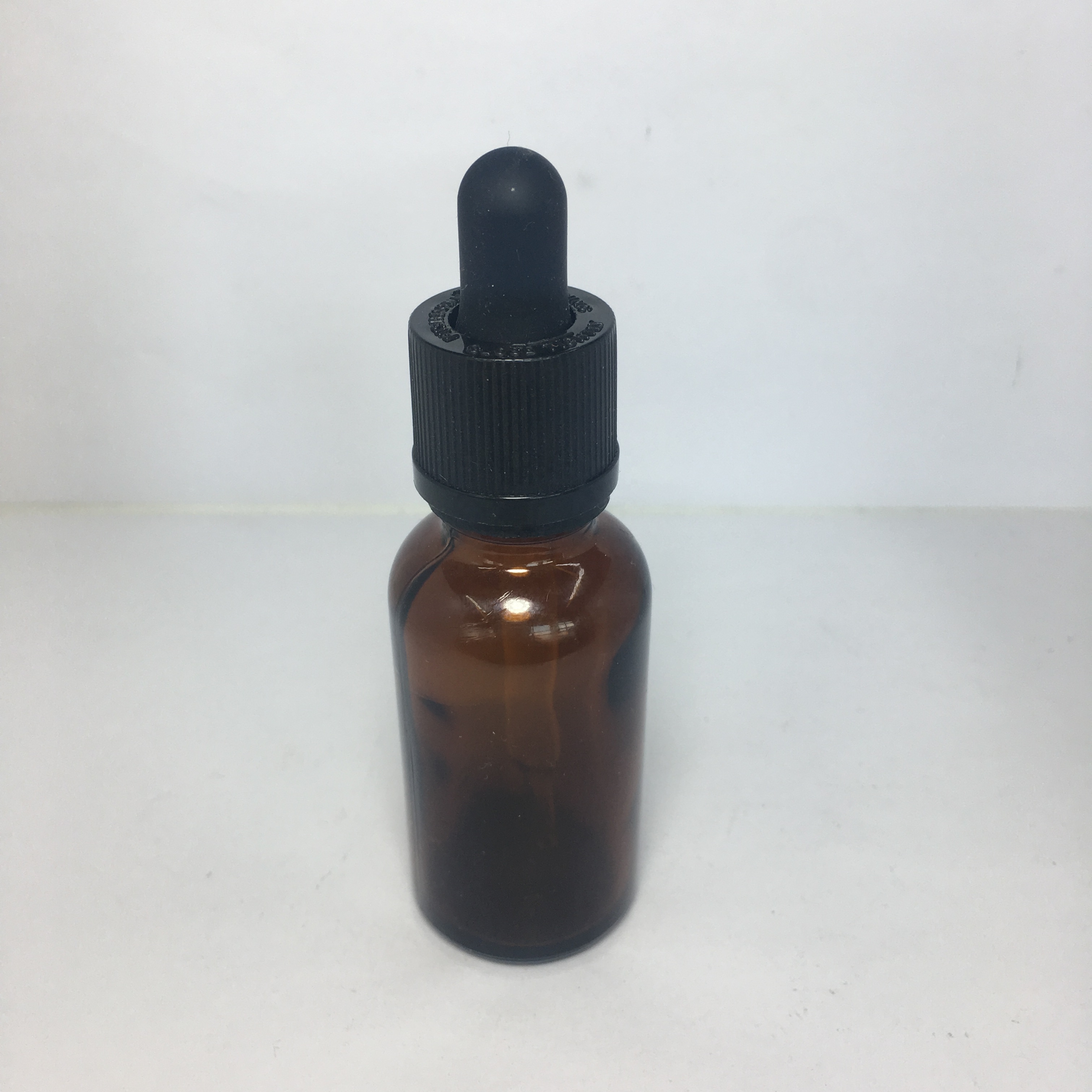 30ml 1oz amber essential oil glass bottle with child resistant and tamper evident glass dropper for cosmetic packaging