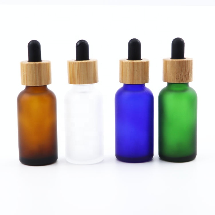 30ml 1oz glass bottle manufacture cobalt blue frosted glass bottles with bamboo cap