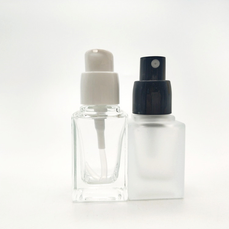 30ml 40 ml empty makeup liquid clear glass foundation bottle with black pump for cosmetics