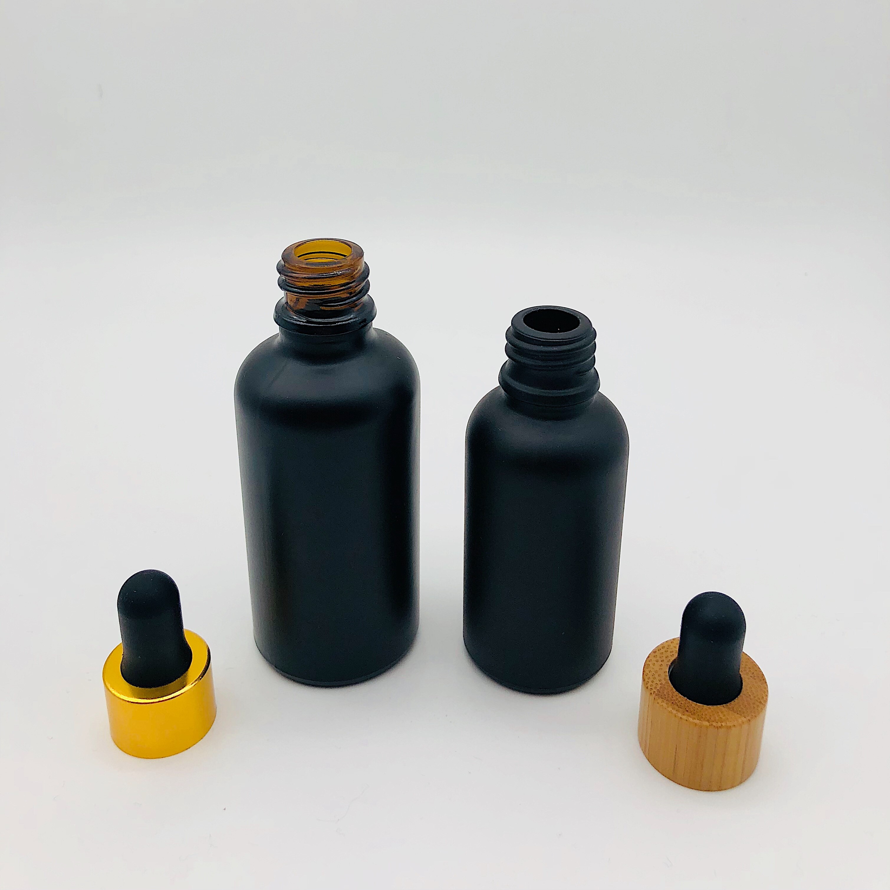 30ml 50ml 100 ml Essential Oil Glass Dropper Bottle Matte Black Glass Bottle with Bamboo Cap