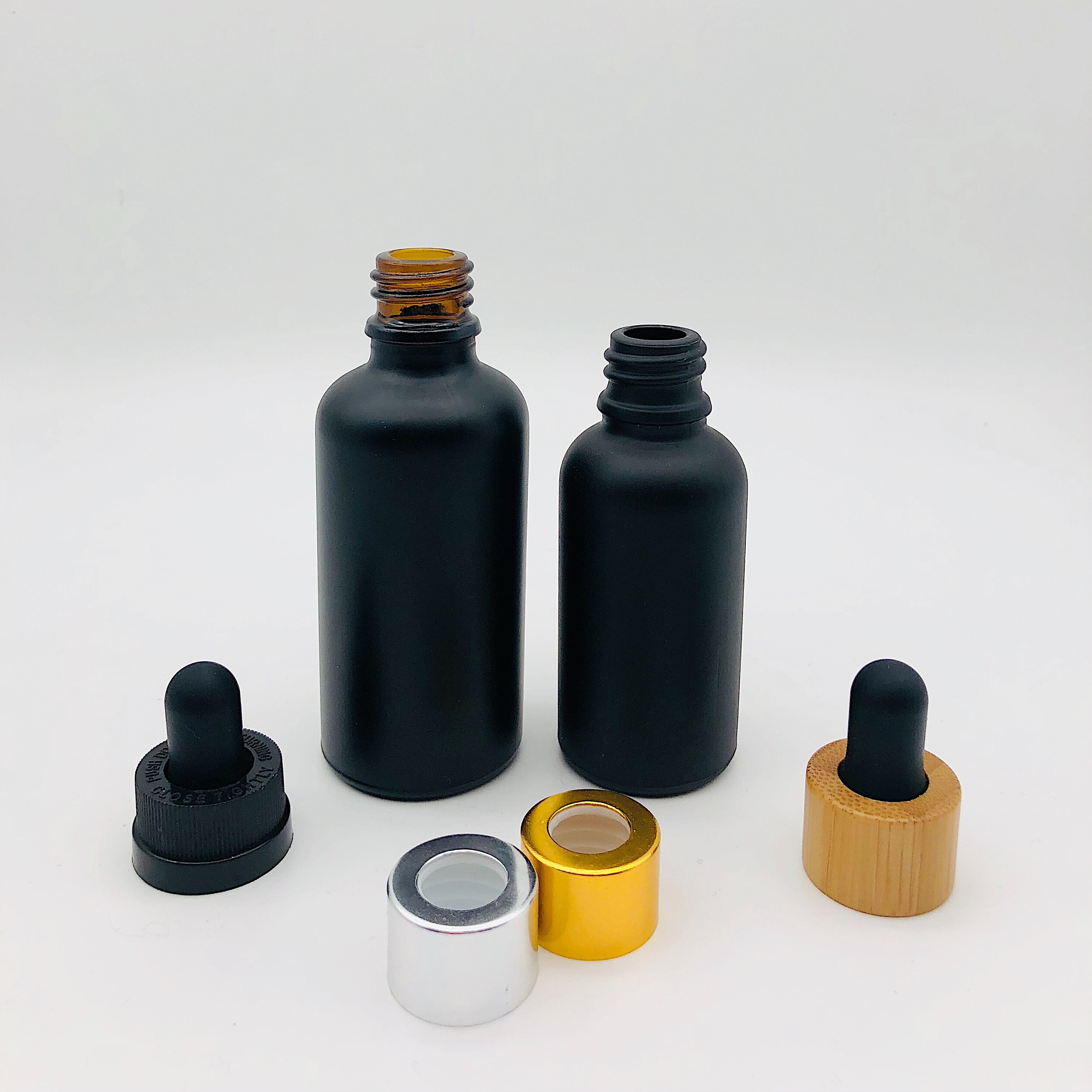 30ml 50ml 100 ml Essential Oil Glass Dropper Bottle Matte Black Glass Bottle with Bamboo Cap