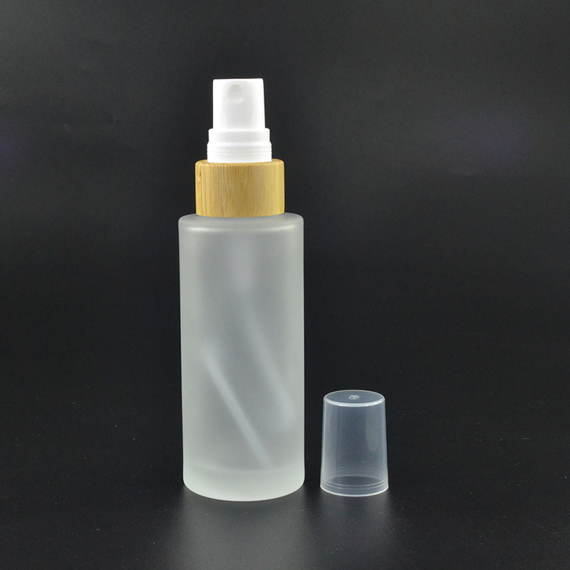 30ml 50ml 100ml 120ml 150ml flat shoulder clear frosted glass spray bottle with bamboo spray mist cap supplier in China