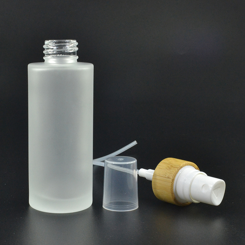 30ml 50ml 100ml 120ml 150ml flat shoulder clear frosted glass spray bottle with bamboo spray mist cap supplier in China