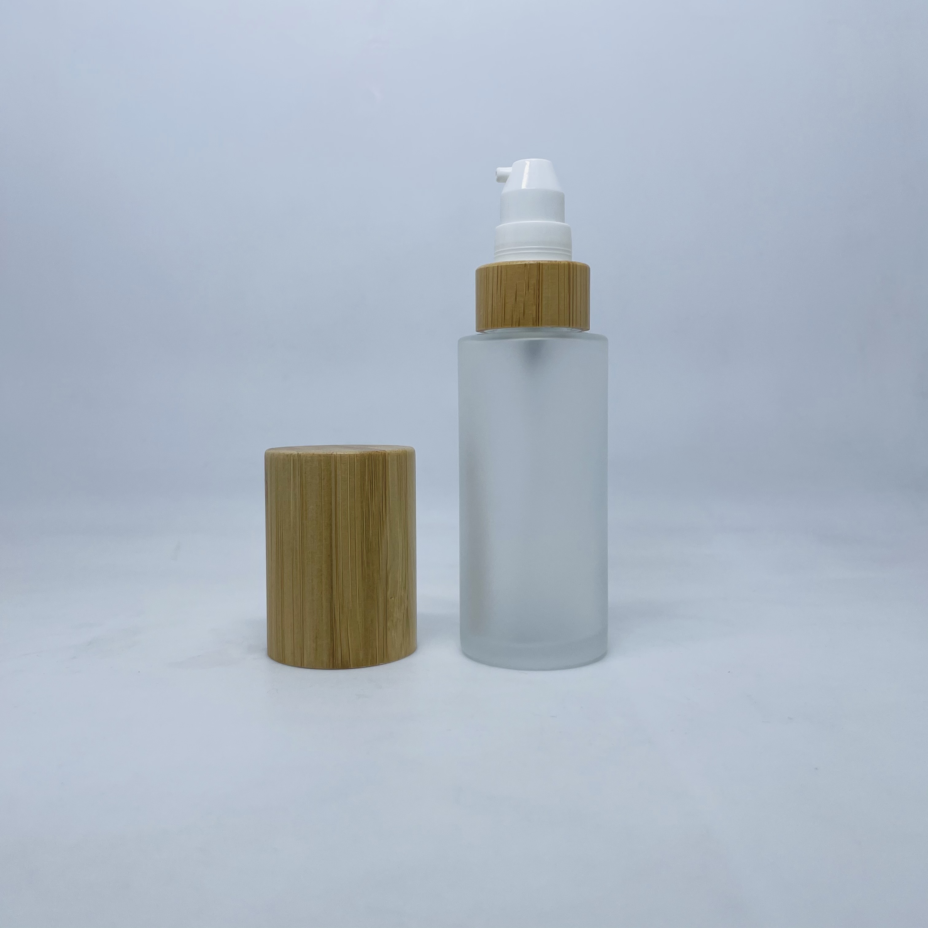 30ml 50ml 100ml 120ml clear Frosted glass cosmetic bottle with bamboo pump lotion spray caps container
