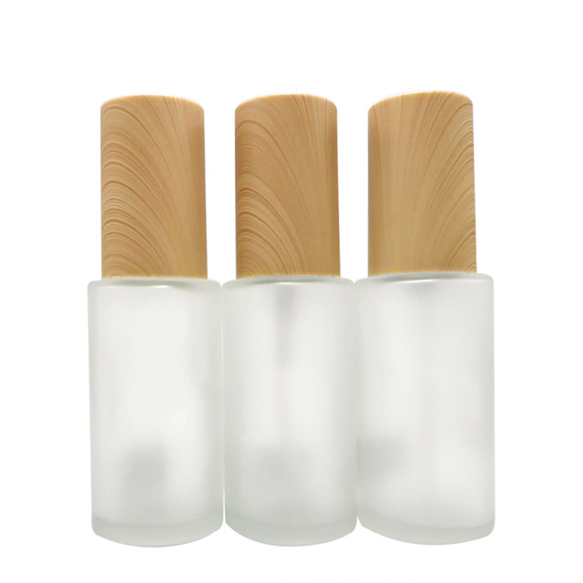 30ml 50ml 100ml flat shoulder cosmetic packaging containers bamboo cap frosted glass spray bottle