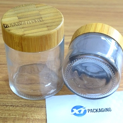 30ml 50ml 60 ml 80ml 100ml customized size clear glass jar container with bamboo wooden lid bamboo cap