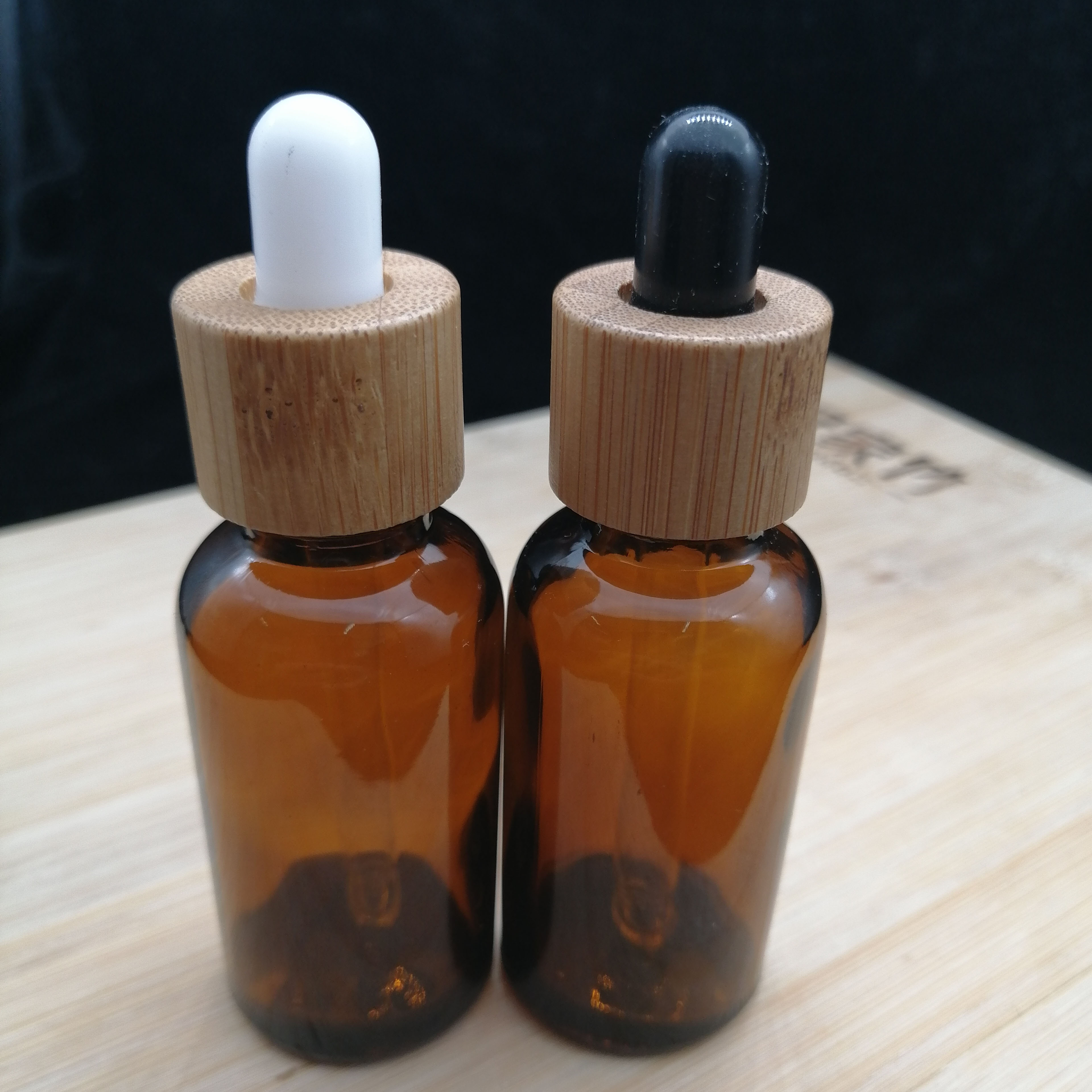 30ml amber essential oil glass bottle with eco-friendly bamboo and wood cap dropper cosmetic container