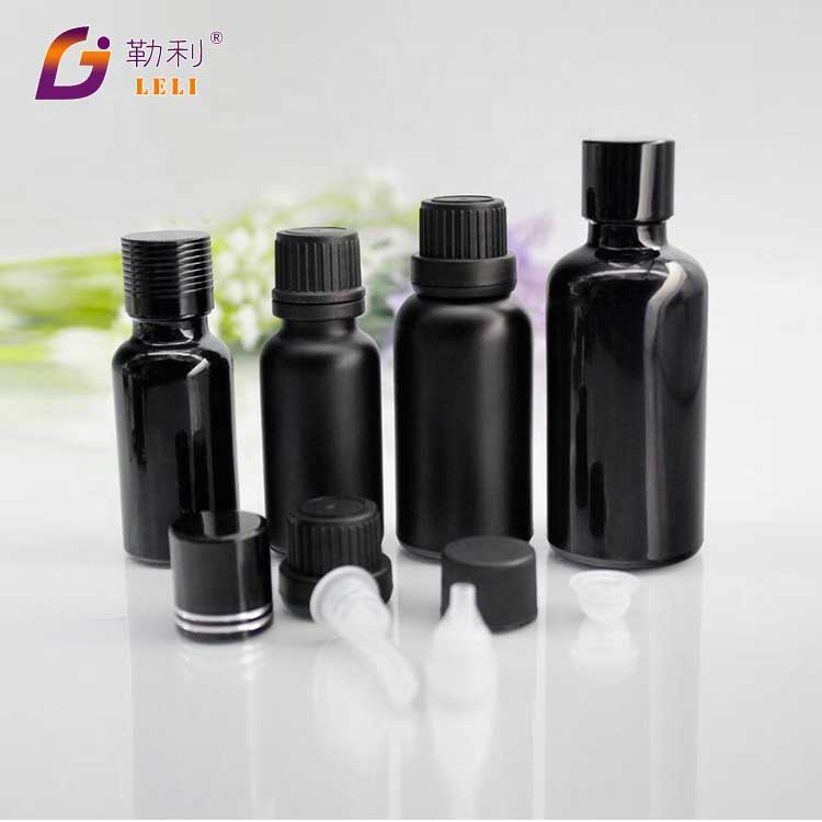 30ml black boston round glass bottle with orifice reducer and euro dropper