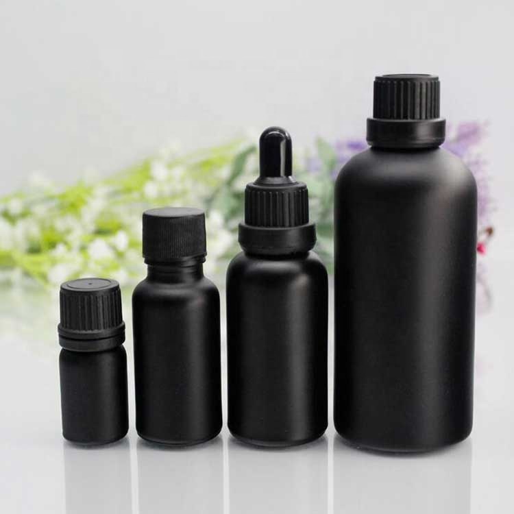 30ml black boston round glass bottle with orifice reducer and euro dropper
