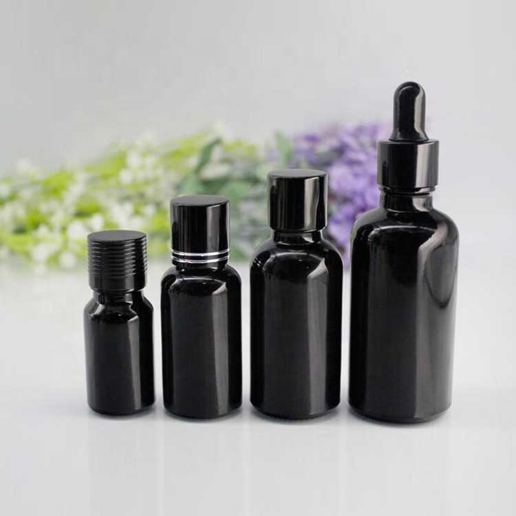 30ml black boston round glass bottle with orifice reducer and euro dropper