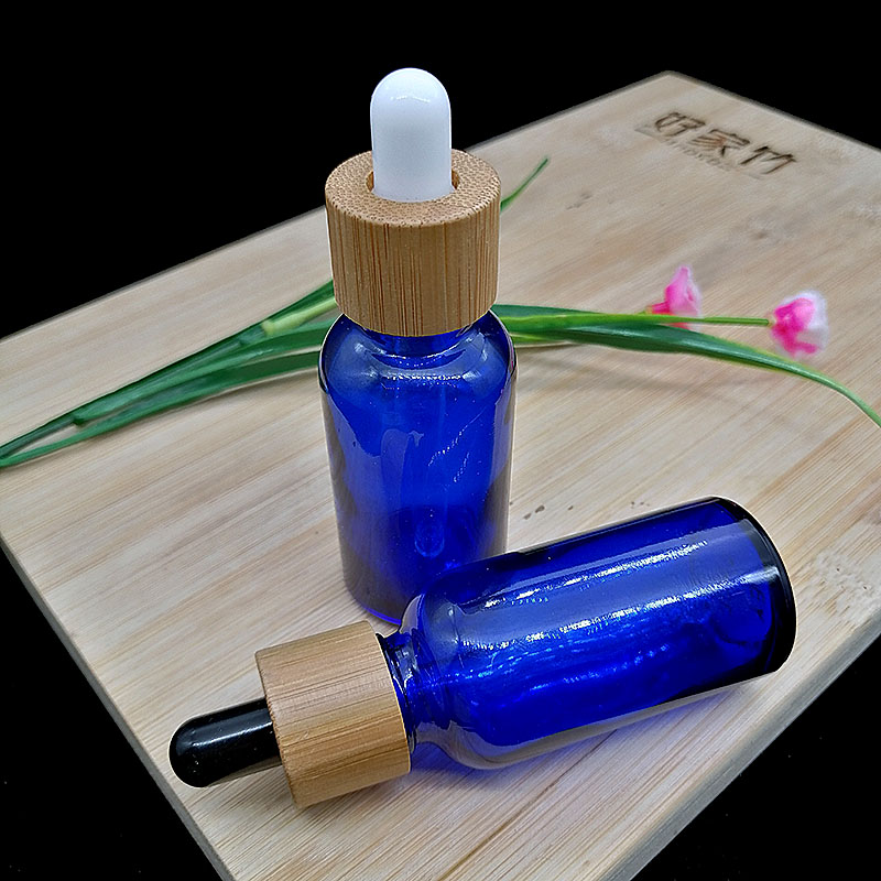 30ml blue essential oil glass dropper bottle with eco-friendly wood grain Glass pipette bamboo cap