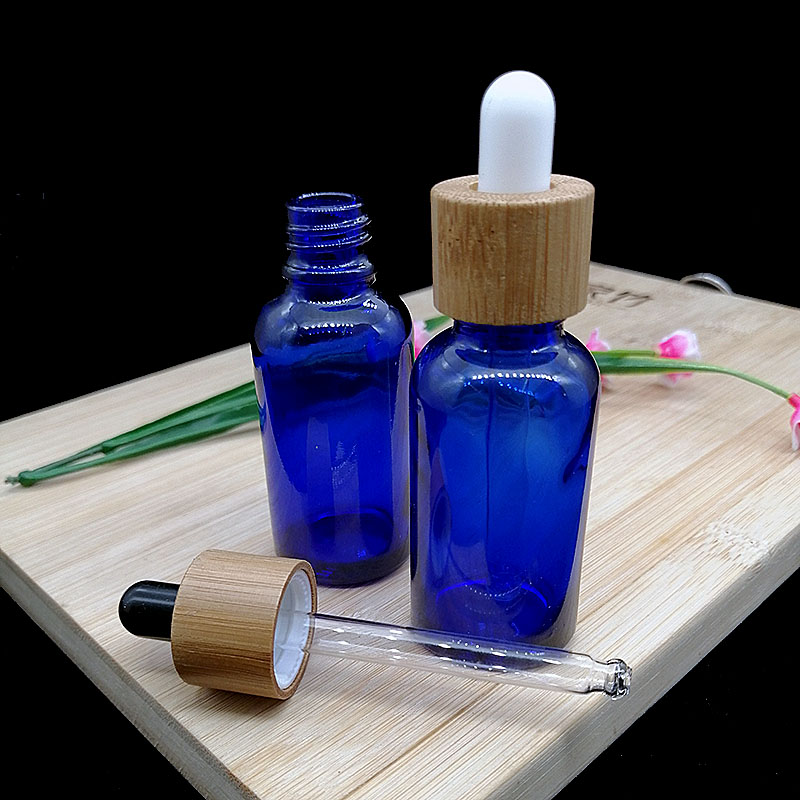 30ml blue essential oil glass dropper bottle with eco-friendly wood grain Glass pipette bamboo cap